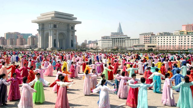 Dancing parties of youth and students took place Monday across the country on the occasion of the 4th anniversary of supreme leader Kim Jong Un's assumption of the top posts of the party and the state, in this photo released by North Korea's Korean Central News Agency (KCNA) on April 11, 2016. (Photo by Reuters/KCNA)