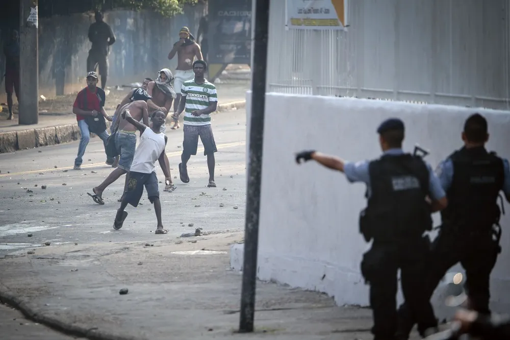 Squatters Clash with Police in Rio