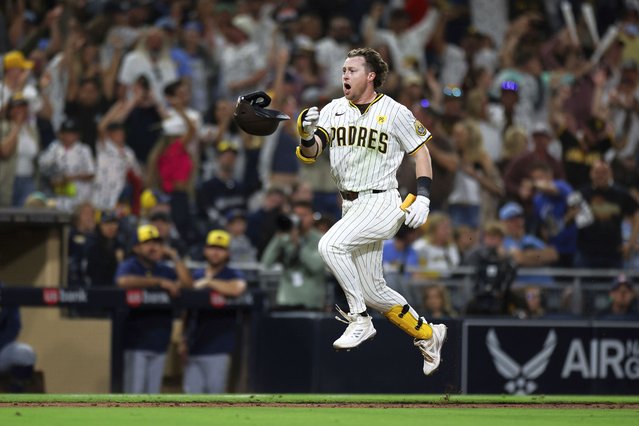 San Diego Padres' Jake Cronenworth celebrates as he nears home after hitting a game-winning solo home run against the Milwaukee Brewers during the ninth inning of a baseball game Thursday, June 20, 2024, in San Diego. (Photo by Derrick Tuskan/AP Photo)