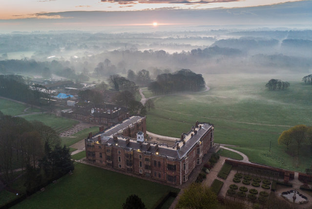 The sun rises this morning as the morning mist starts to roll over the Capability Brown landscaped grounds of Tudor-Jacobean Temple Newsam house in Leeds, Yorkshire on April 2, 2024. (Photo by Andrew McCaren/London News Pictures)