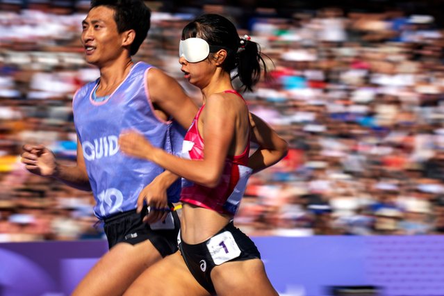 Shanshan He, of China, competes at Women's 1500 -T11 at the Stade de France stadium, during the 2024 Paralympics, Sunday, September 1, 2024, in Paris, France. (Photo by Emilio Morenatti/AP Photo)