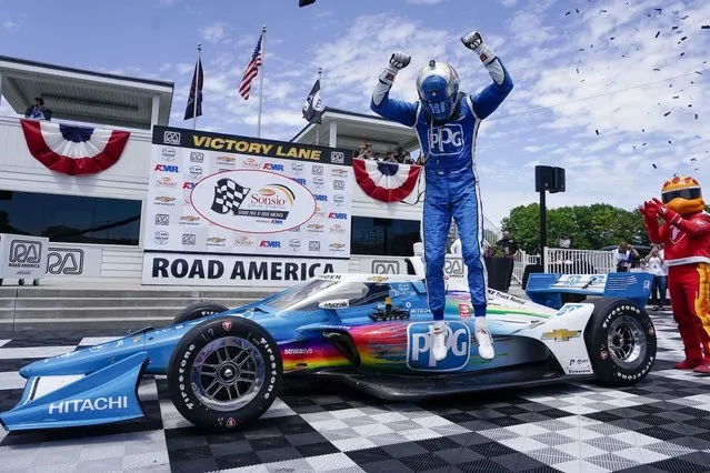 Josef Newgarden reacts after winning the Sonsio Grand Prix, Sunday, June 12, 2022, in Elkhart Lake, Wis. (Photo by Morry Gash/AP Photo)