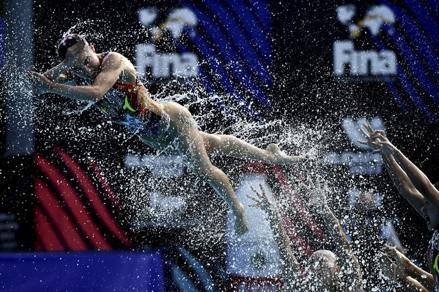 Team Japan competes during the final of the free combination of artistic swimming at the 19th FINA World Championships in Budapest, Hungary, Monday, June 20, 2022. (Photo by Anna Szilagyi/AP Photo)
