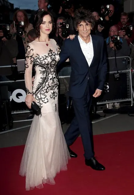 Ronnie Wood of the Rolling Stones and his wife Sally Wood arrive for the GQ Men of the Year Awards at the Royal Opera House in London, Britain September 8, 2015. (Photo by Suzanne Plunkett/Reuters)