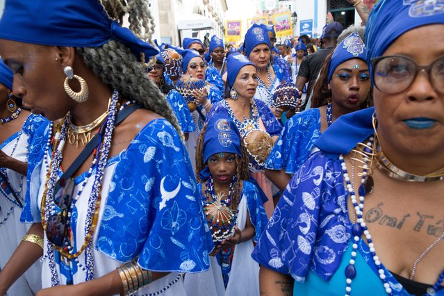 Revellers from cultural society Filhas de Gandhy parade during Carnival festivities in Salvador in the state of Bahia, Brazil, on March 1, 2025. (Photo by Antonello Veneri/Reuters)