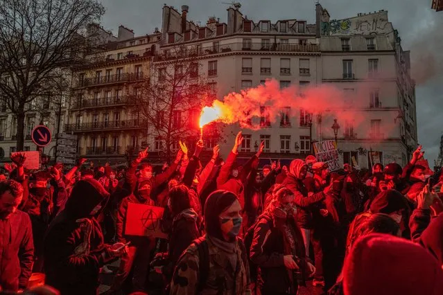 Protesters gather during demonstrations against a draft bill on December 12, 2020 in Paris, France. The draft bill, known as the “global security law”, prohibited taking and publishing photos of police “with malevolent intent”. Critics said the ban would make it difficult to document policy brutality, an issue reignited by a recent incident in which white policemen here beat a black music producer. (Photo by Veronique de Viguerie/Getty Images)