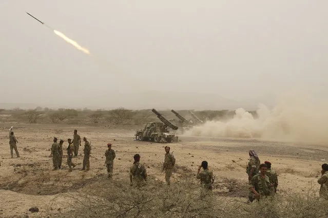 Yemeni army forces fire a missile towards of al Qaeda-linked militants positions in the southern province of Abyan June 4, 2012. (Photo by Reuters/Yemen's Defence Ministry)