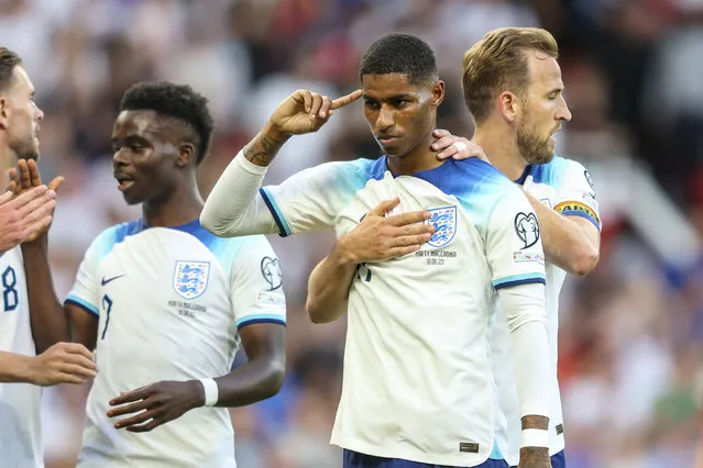 Skipper Harry Kane congratulates team-mate Marcus Rashford of England after he scores a goal to make it 3-0 during the UEFA EURO 2024 qualifying round group C match between England and North Macedonia at Old Trafford on June 19, 2023 in Manchester, England. (Photo by Robin Jones/Getty Images)