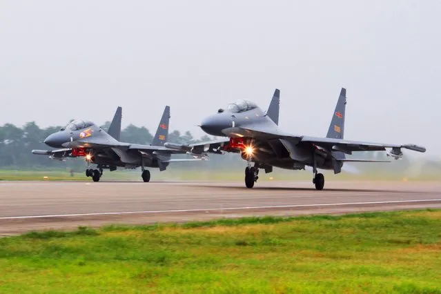 In this undated photo released by China's Xinhua News Agency, two Chinese SU-30 fighter jets take off from an unspecified location to fly a patrol over the South China Sea. China’s People’s Liberation Army sent 13 aircraft and 6 vessels into airspace and waters around Taiwan over the past 24 hours as of early Saturday, July 8, 2023, overlapping with United States Treasury Secretary Janet Yellen’s visit to Beijing aimed at mending strained relations. (Photo by Jin Danhua/Xinhua via AP Photo)
