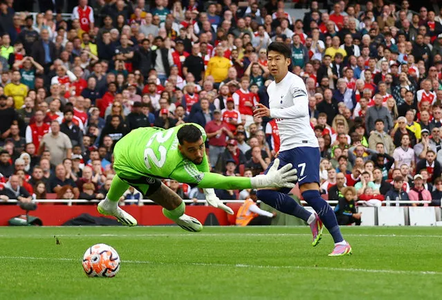 Son Heung-min of Tottenham Hotspur scores his 2nd goal during the Premier League match between Arsenal FC and Tottenham Hotspur at Emirates Stadium on September 24, 2023 in London, England. (Photo by Matthew Childs/Action Images via Reuters)