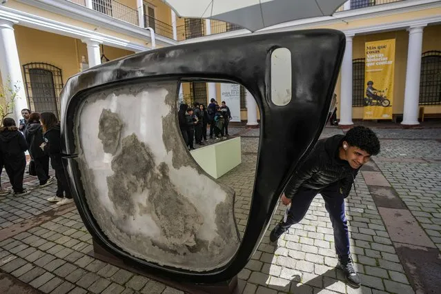 A sculpture depicting half of a pair of black-framed glasses Chilean President Salvador Allende was wearing when he died, is displayed in the patio of the National Museum of History in Santiago, Chile, Thursday, September 7, 2023. Gen. Augusto Pinochet led a military coup on Sept. 11, 1973, that included the bombing of the presidential palace in the capital of Santiago, where Allende had taken refuge. Allende died by suicide during the assault. (Photo by Esteban Felix/AP Photo)