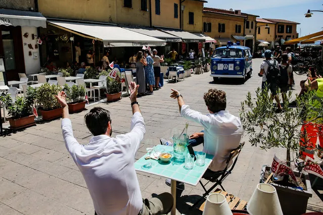 Vintage and historic cars during the “Mille Miglia” vintage cars rally, in Castiglione della Pescaia, near Grosseto, Tuscany, Italy, 17 June 2021. The classic Mille Miglia (1,000 Miles) is a race from Brescia to Rome and back. (Photo by Fabio Frustaci/EPA/EFE)