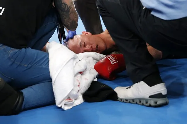 Lee Fook lays motionless after being knocked out by Miles Zalewski in their undercard bout, before the Commonwealth Super Welterweight Title Bout between Tim Tszyu and Steve Spark at the Newcastle Entertainment Centre, Newcastle, Australia, 07 July 2021. (Photo by Dan Himbrechts/EPA/EFE)