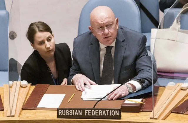 Vassily Nebenzea (R), Russia's Ambassador to the United Nations, at the start of a United Nations Security Council meeting, which was called by Russia related to fighting near the Zaporizhzhia nuclear plant in southern Ukraine, at United Nations headquarters in New York, New York, USA on 23 August 2022. Russia and Ukraine are blaming each other for escalating violence near the power plant. (Photo by Justin Lane/EPA/EFE)