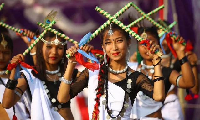 Tharu girls in traditional clothes participate in a rally to mark the opening of the 15th Elephant Festival in Sauraha, Nepal, a tourism hub in the southwest of the country on December 26, 2018. (Photo by Sunil Sharma/Xinhua News Agency/Barcroft Images)