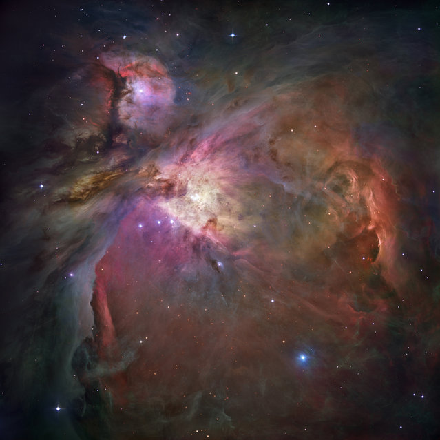 This image made by the NASA/ESA Hubble Space Telescope shows the Orion Nebula and the proceess of star formation, from the massive, young stars that are shaping the nebula to the pillars of dense gas that may be the homes of budding stars. (Photo by NASA, ESA, M. Robberto – Space Telescope Science Institute/ESA via AP Photo)