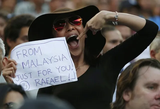 Tennis, Australian Open, Melbourne Park, Melbourne, Australia on January 27, 2017. A supporter of Spain's Rafael Nadal holds a sign during his Men's singles semi-final match against Bulgaria's Grigor Dimitrov. (Photo by Issei Kato/Reuters)