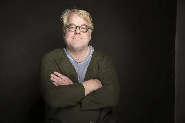 In a January 19, 2014 photo Phillip Seymour Hoffman poses for a portrait at The Collective and Gibson Lounge Powered by CEG, during the Sundance Film Festival in Park City, Utah. Hoffman, who won the Oscar for best actor in 2006 for his portrayal of writer Truman Capote in “Capote”  was found dead Sunday in his apartment in New York with what law enforcement officials said was a syringe in his arm. He was 46. (Photo by Victoria Will/AP Photo/Invision)