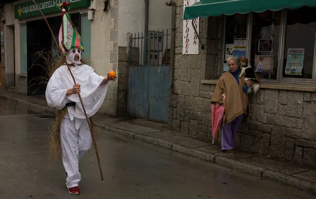 A reveller, dressed as “Zarramache”, walks through the streets during celebrations to mark Saint Blaise's festivity in Casavieja, Spain February 3, 2017. (Photo by Sergio Perez/Reuters)