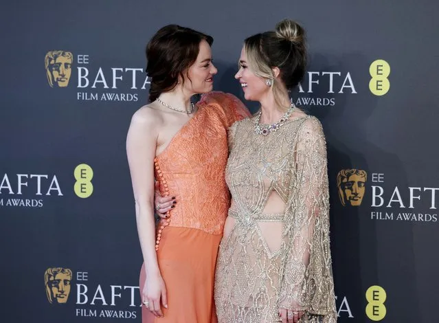 American actress Emma Stone and British actress Emily Blunt arrive at the 2024 British Academy of Film and Television Awards (BAFTA) at the Royal Festival Hall in the Southbank Centre, London, Britain, on February 18, 2024. (Photo by Isabel Infantes/Reuters)
