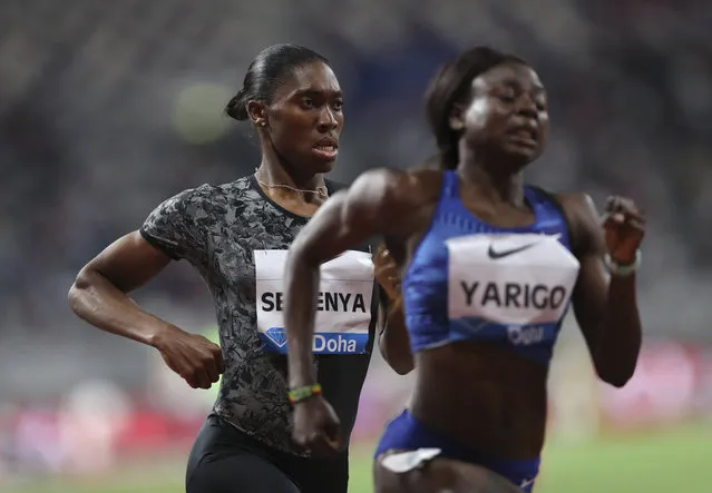 South Africa's Caster Semenya, left, competes to win the gold in the women's 800-meter final during the Diamond League in Doha, Qatar, Friday, May 3, 2019. (Photo by Kamran Jebreili/AP Photo)