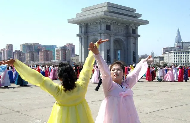 Dancing parties of youth and students took place Monday across the country on the occasion of the 4th anniversary of supreme leader Kim Jong Un's assumption of the top posts of the party and the state, in this photo released by North Korea's Korean Central News Agency (KCNA) on April 11, 2016. (Photo by Reuters/KCNA)
