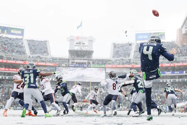 Michael Dickson #4 of the Seattle Seahawks punts the ball during the second quarter against the Chicago Bears at Lumen Field on December 26, 2021 in Seattle, Washington. (Photo by Steph Chambers/Getty Images)