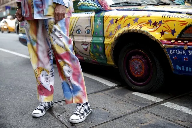 Artist Gretchen Baer of BisBee, Arizona, stands next to the “Hilcar”, a car she painted and decorated in support of Democratic U.S. presidential candidate Hillary Clinton, in the Manhattan borough of New York City, U.S. April 18, 2016. (Photo by Mike Segar/Reuters)