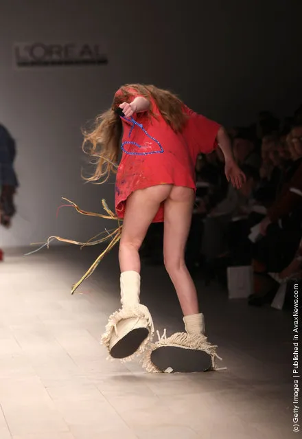 A model walks the runway during the Central Saint Martins MA Fashion show featuring student Luke Brooks at London Fashion Week Autumn/Winter 2012