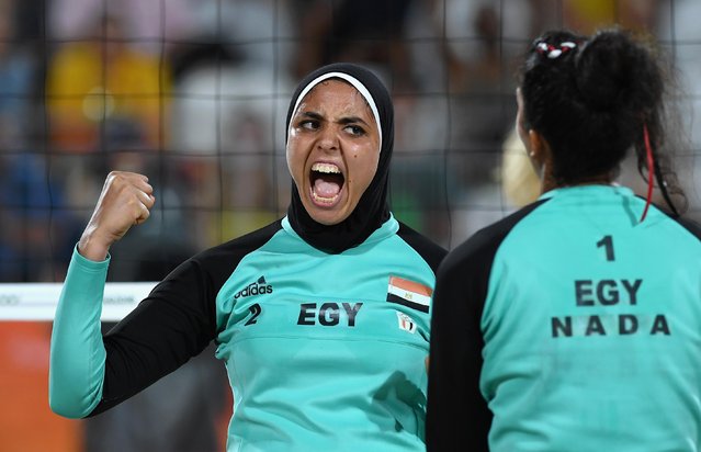 Doaa Elghobashy of Egypt reacts during the Women's Beach Volleyball preliminary round Pool D match against Laura Ludwig and Kira Walkenhorst of Germany on Day 2 of the Rio 2016 Olympic Games at the Beach Volleyball Arena on August 7, 2016 in Rio de Janeiro, Brazil. (Photo by Shaun Botterill/Getty Images)