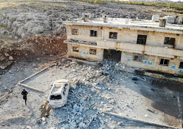 This picture taken early on November 6, 2019 shows an aerial view of a hospital that was reportedly hit by an air strike in the Syrian village of Shinan, about 30 kilometres south of Idlib in the northwestern Idlib province. (Photo by Omar Haj Kadour/AFP Photo)