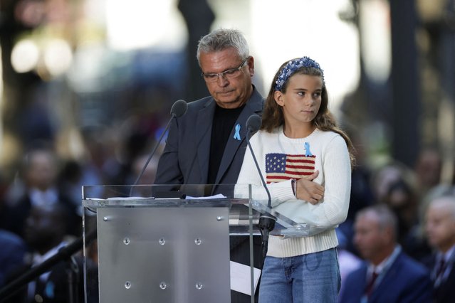 People attend a ceremony marking the 23rd anniversary of the September 11, 2001 attacks on the World Trade Center at the 9/11 Memorial and Museum in Manhattan, New York City on September 11, 2024. (Photo by Kent J.Edwards/Reuters)