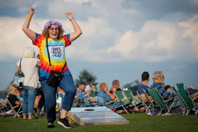 Guests arrive for the Arlo Guthrie concert at the Bethel Woods Center for the Arts, the original site of the Woodstock Festival, on the 50th anniversary in Bethel, New York, U.S. August 15, 2019. (Photo by Brendan McDermid/Reuters)