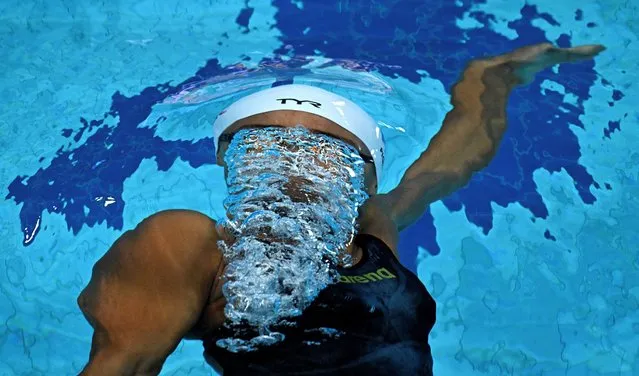 France's Analia Pigree competes in a heat for the women's 50m backstroke during the Budapest 2022 World Aquatics Championships at Duna Arena in Budapest on June 21, 2022. (Photo by Attila Kisbenedek/AFP Photo)