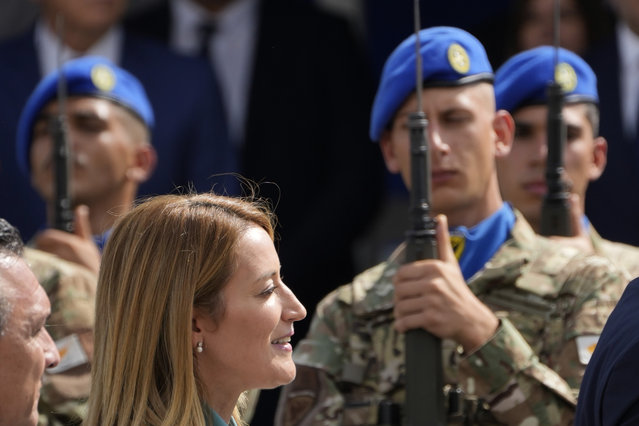 European Parliament President Roberta Metsola, left, arrives at the area before a military parade marking the 63th anniversary of Cyprus' independence from British colonial rule, in divided capital Nicosia, Cyprus, on Sunday, October 1 2023. Metsola joined Christodoulides in receiving the salute from Cypriot National Guard forces during a parade marking Cyprus' 63rd Day of Independence from British colonial rule. The Cypriot government said Metsola is the first top EU official to attend the parade since Cyprus joined the EU in 2004. (Photo by Petros Karadjias/AP Photo)