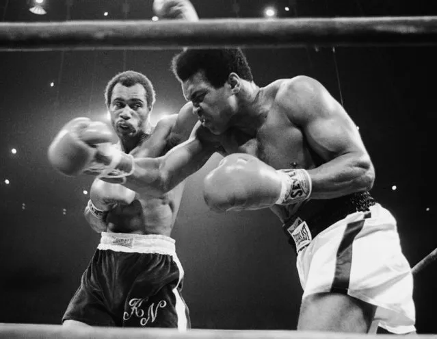 Muhammad Ali, right, winces as Ken Norton hits him with a left to the head in their scheduled 12-round re-match, September 10, 1973 at the Forum in Inglewood, California. (Photo by AP Photo)