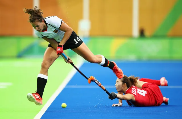 Janne Muller-Wieland of Germany is challenged by Jungeun Seo of Korea during the Women's Pool B Match between Germany and Korea on Day 5 of the Rio 2016 Olympic Games at the Olympic Hockey Centre on August 10, 2016 in Rio de Janeiro, Brazil. (Photo by Mark Kolbe/Getty Images)