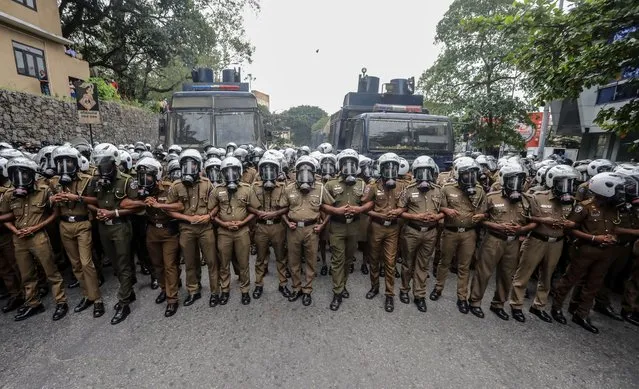 Security forces deployed to disperse anti-government protesters in Colombo, Sri Lanka, 30 August 2022. Hundreds of university students, trade union members and civil rights activists took to the streets to condemn the government's enforcement of the prevention of terrorism act (PTA) to crack down on anti-government protesters. Sri Lanka has been rocked by over four months of protests as the country faces its worst economic crisis due to the lack of foreign reserves, resulting in severe shortages in food, fuel, medicine, and imported goods. (Photo by Chamila Karunarathne/EPA/EFE/Rex Features/Shutterstock)