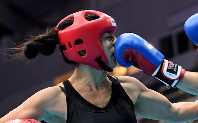 Israel' s Adva Ohayon is beaten by France' s Jeromine Moser (not pictured) in the “Women Low kick -60 kg” category in the “BOK” sports hall in Budapest, on November 7, 2017 during the one- week long “World Association of Kickboxing Organizations” (WAKO) world championships. During this world championship all disciplines of the kick box sport struggle at one place and at the same time. (Photo by Attila Kisbenedek/AFP Photo)