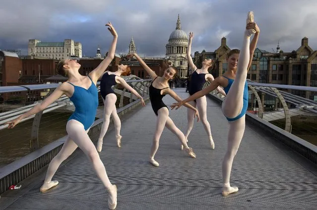 Candidates in the Royal Academy of Dance's Genee International Ballet Competition pose for photographs on Millennium Bridge on September 18, 2015 in London, England. 76 Dancers from 16 countries will take part in one of the world's most prestigious ballet competitions this weekend. The Genee International Ballet Competition returns to London where it first took place in 1931. (Photo by Ben Pruchnie/Getty Images)