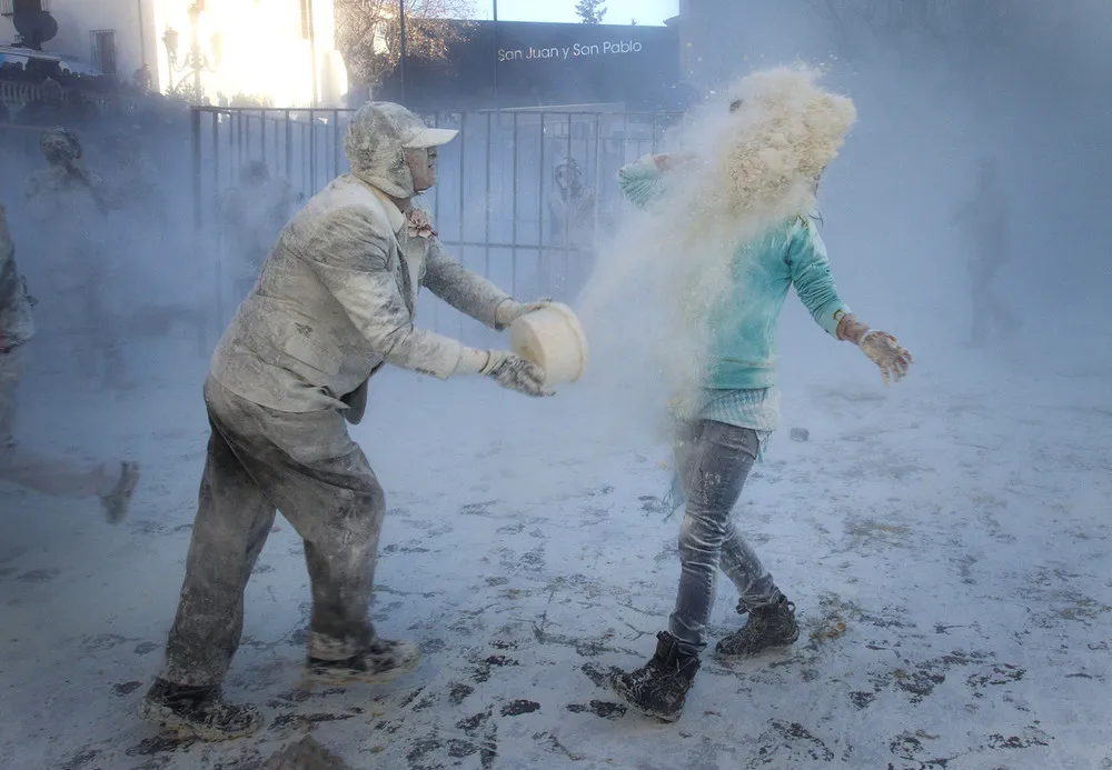 Els Enfarinats Festival Celebrated with Flour Fight in Ibi