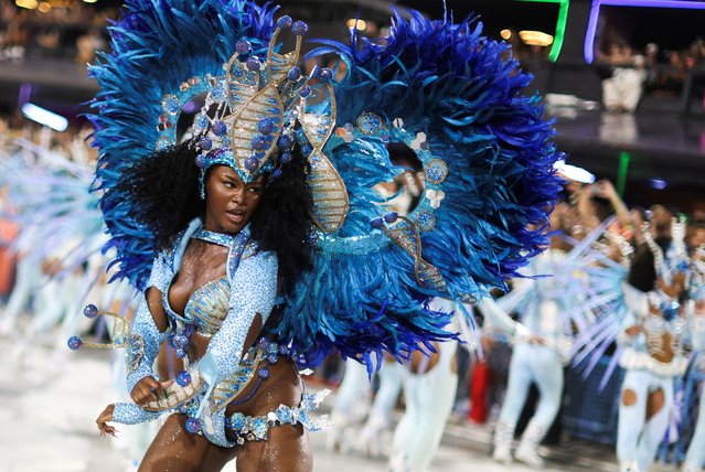 A reveller from Vila Isabel Samba School performs during the night of the Carnival parade at the Sambadrome, in Rio de Janeiro, Brazil on February 13, 2024. (Photo by Pilar Olivares/Reuters)