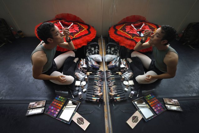 In this photo issued 25 June 2025, Ivan Felix, co-founder of Latin America's first all-male pointe company Males on Pointe gets ready for a rehearsal in Mexico City, Mexico, 24 June 2025. Males on Pointe seeks to celebrate diversity, taking inspiration from “alebrijes” in its choreographies during Mexico Pride week. Mexican artist Pedro Linares created the first “alebrijes” or fantastical sculptures of animals, people or imaginary creatures which he painted in vibrant colors and intricate patterns, approximately 100 years ago. (Photo by Sashenka Gutierrez/EPA)