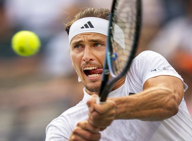 Alexander Zverev, of Germany, hits a backhand return to Alexei Popyrin, of Australia, during their quarterfinal match at the National Bank Open men's tennis tournament in Toronto, Monday, August 4, 2025. (Photo by Frank Gunn/The Canadian Press via AP Photo)