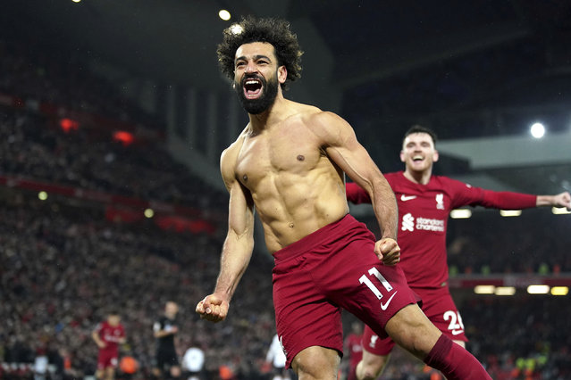Liverpool's Mohamed Salah celebrates after scoring his side's sixth goal during the English Premier League soccer match between Liverpool and Manchester United at Anfield in Liverpool, England, Sunday, March 5, 2023. (Photo by Peter Byrne/PA Wire via AP Photo)