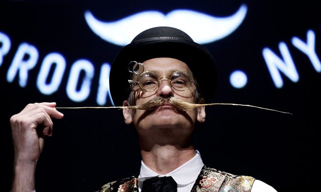Alfred Nash from Los Angeles, California wins the 'English moustache' contest at the National Beard & Moustache Championships at Kings Theatre in Brooklyn, New York, USA, 07 November 2015. (Photo by Peter Foley/EPA)