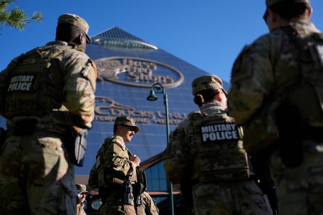 Members of National Guard patrol outside a Bass Pro Shops, Friday, October 10, 2025, in Memphis, Tenn. (Photo by George Walker IV/AP Photo)