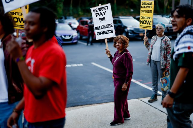 Residents and demonstrators against a planned data center construction project wait to enter a DeKalb County Board of Commissioners meeting in Decatur, Georgia, USA, 20 November 2025. Developers want to build a large data center in Ellenwood, Georgia in southern Dekalb County. (Photo by Erik S. Lesser/EPA)