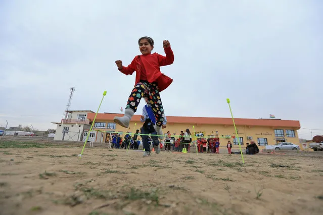 A Yazidi child who survived the 2014 massacre of the religious minority in Sinjar plays outside the Harman orphanage centre in Duhok, Iraq December 19, 2017. (Photo by Ari Jalal/Reuters)