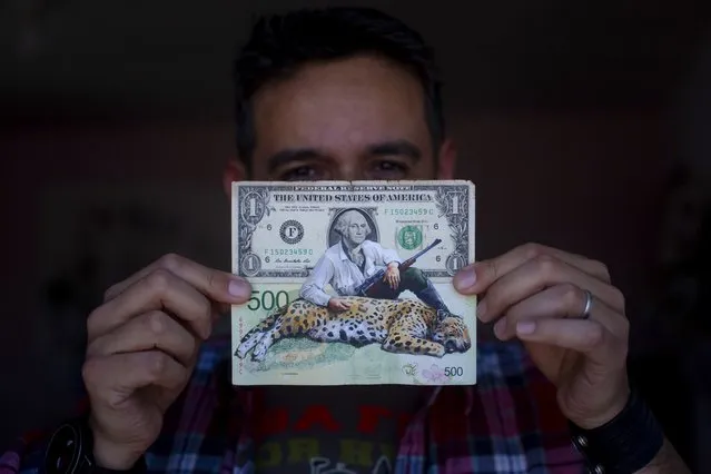 Artist Sergio Díaz holds up a piece of his Money Art; the backdrop a U.S. dollar and an Argentine 500-peso note featuring George Washington holding a rifle alongside a dead jaguar, in his studio in Salta, Argentina, Saturday, September 9, 2023. As millions of Argentines express dismay and anger over the rapid depreciation of the local currency, a group of artists is seeking to show the economic damage through their artwork. (Photo by Javier Corbalan/AP Photo)
